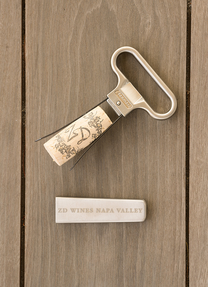 A ZD Wines engraved ah-so wine opener and cork.