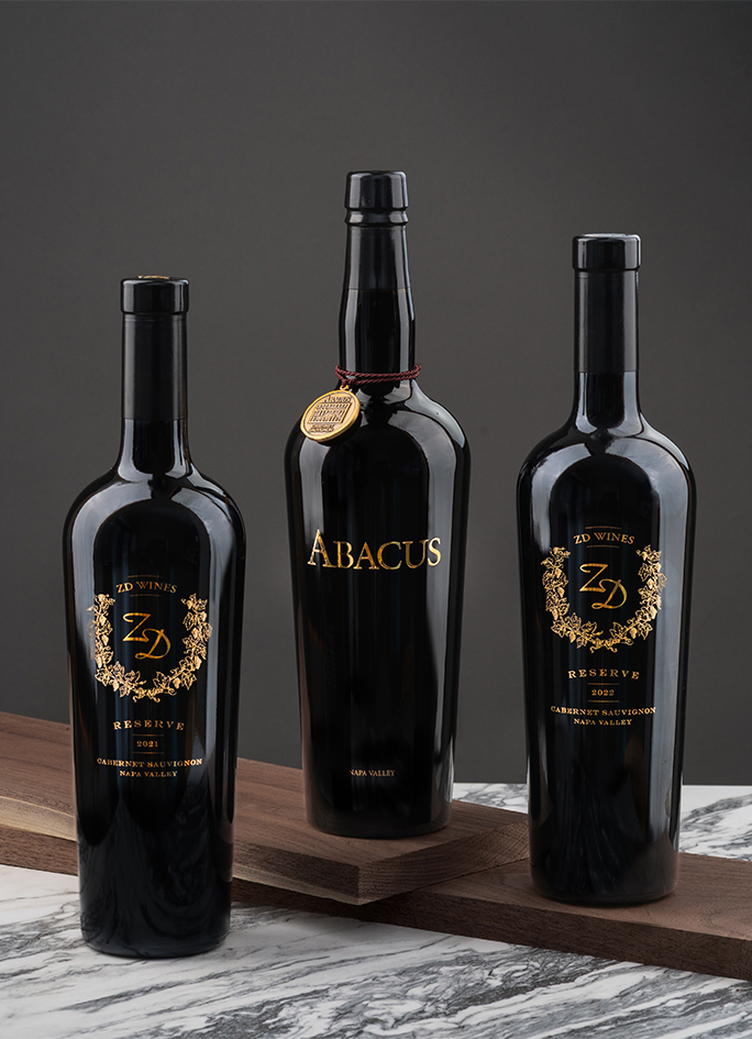 A bottle of Abacus and two bottles of Reserve Cabernet