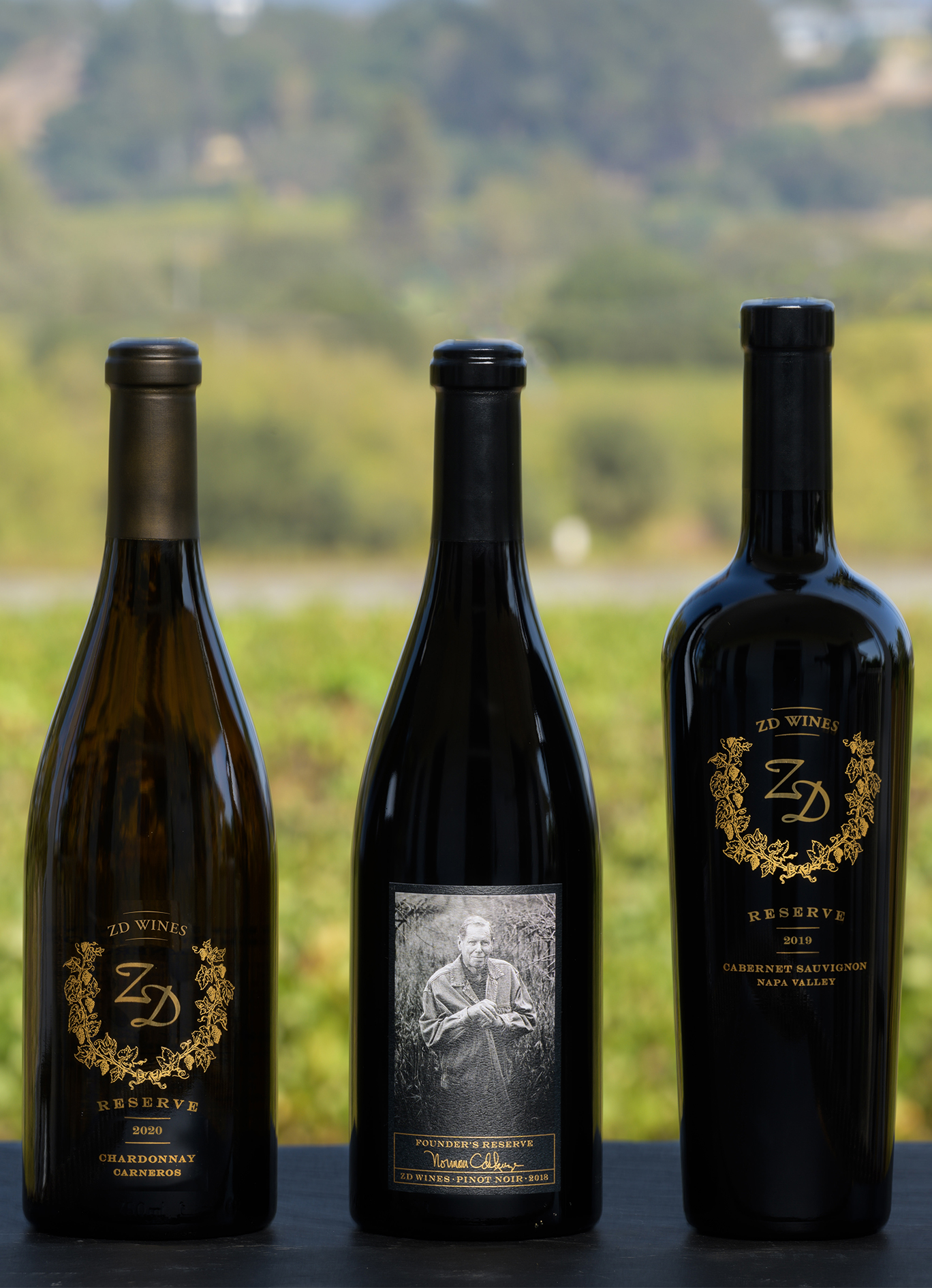 A bottle of Reserve Chardonnay, Pinot Noir, and Cabernet.