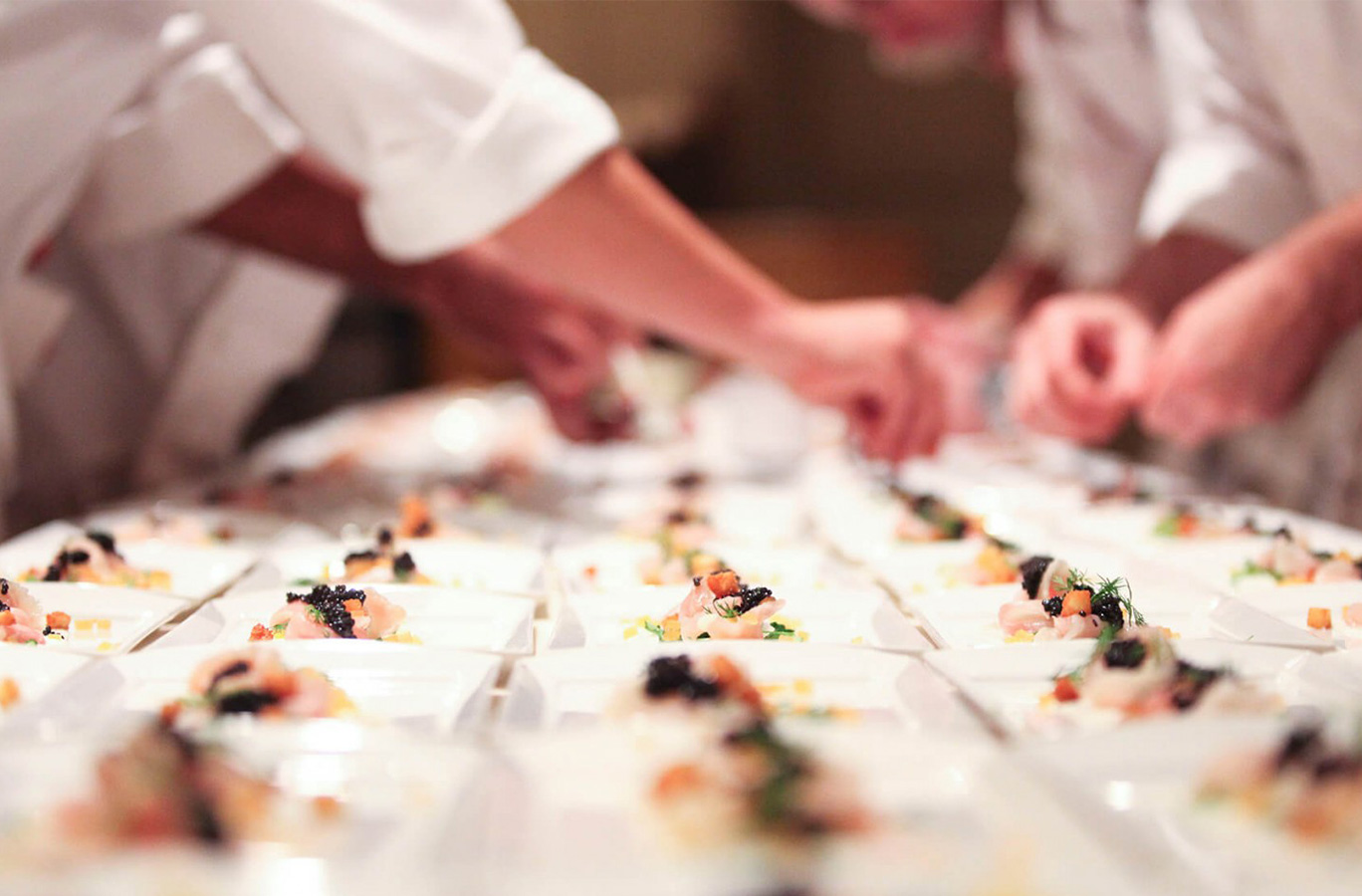 Plates of food at Pebble Beach Food & Wine.
