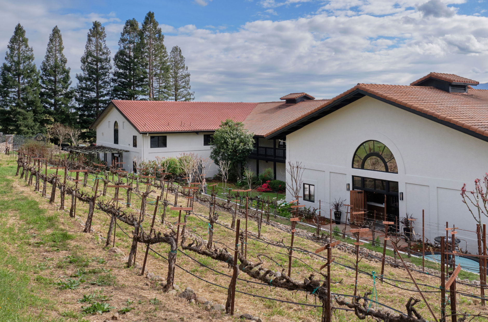 The entrance to the ZD Wines Rutherford winery and vineyards in front