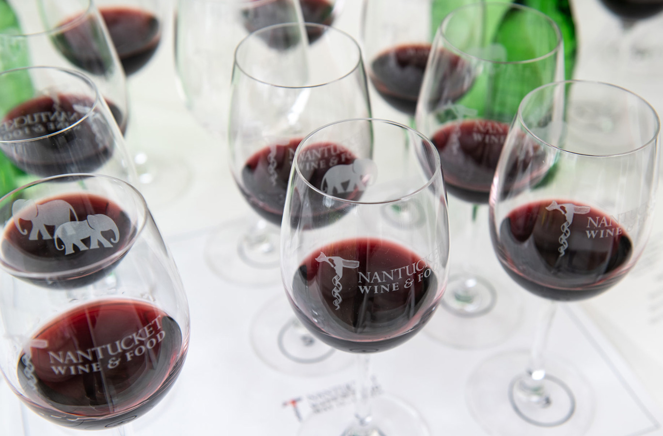 Glasses of wine on a table.