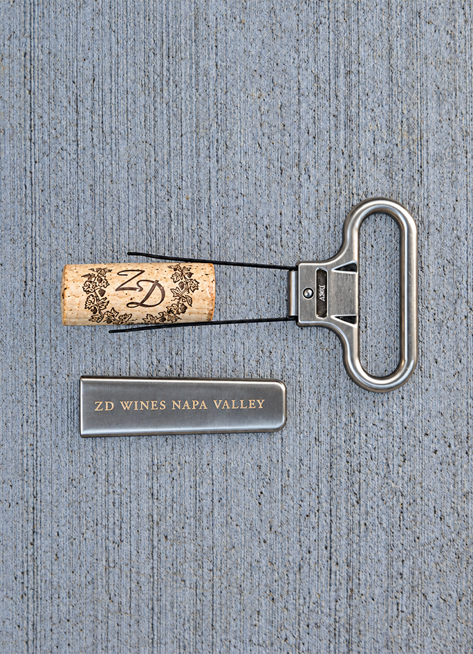 A ZD Wines engraved ah-so wine opener and cork.