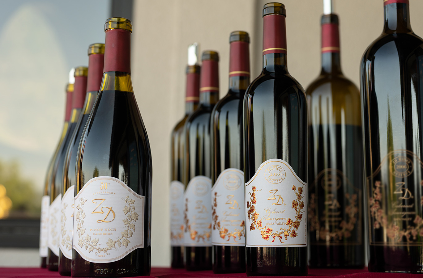 Looking up at bottles of ZD Pinot and Cabernet Sauvignon