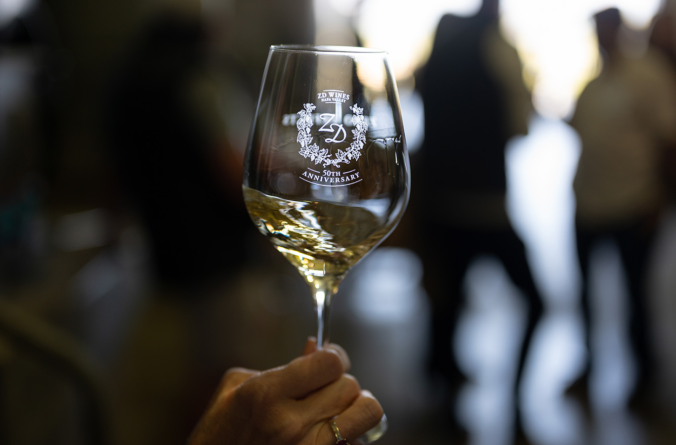 ZD white wine swirling in a glass